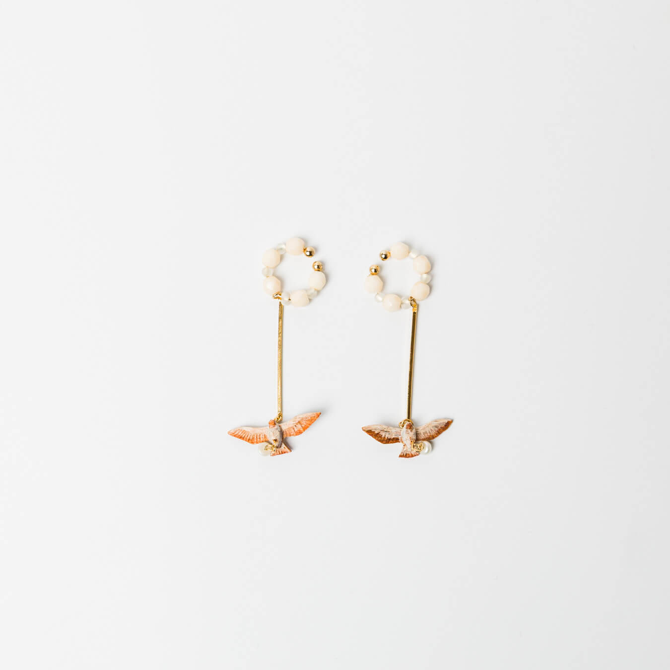 kitona-イヤカフ-鳥飛行