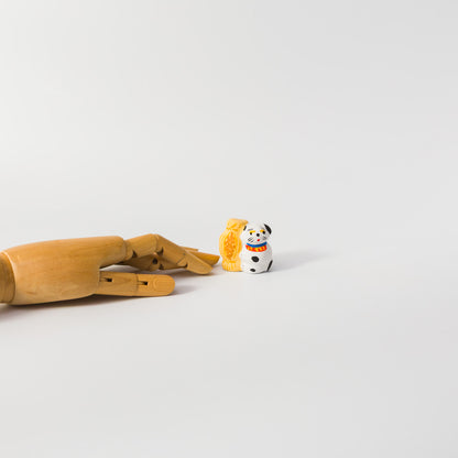 habotan-土人形「納豆にくっつく犬」